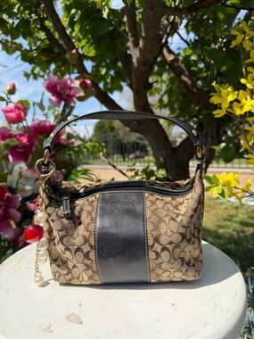 Coach Brown Signature Canvas Shoulder Bag with Black Leather Trim